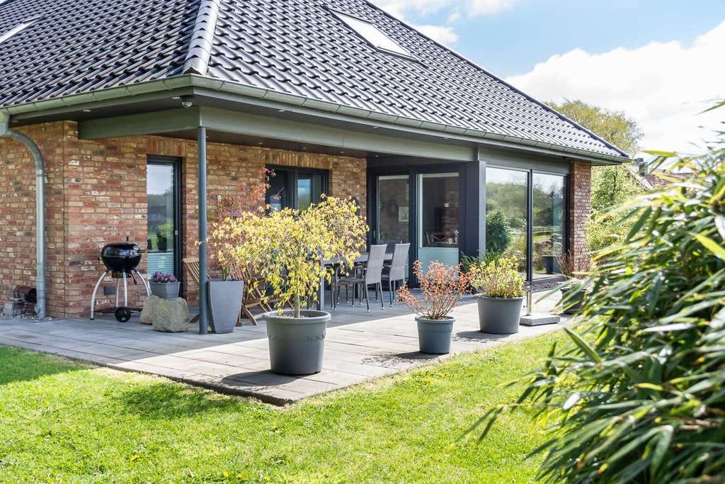 Immobilie in Westensee - Hochwertiges Einfamilienhaus auf über 8.000 m² Grundstück mit Erdwärmepumpe, PV-Anlage und Weitblick - Bild 4