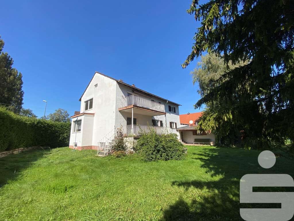 Immobilie in Gröbenzell - Großzügiges Wohnbaugrundstück mit sanierungsbedürftigen Einfamilienhaus - Bild 0