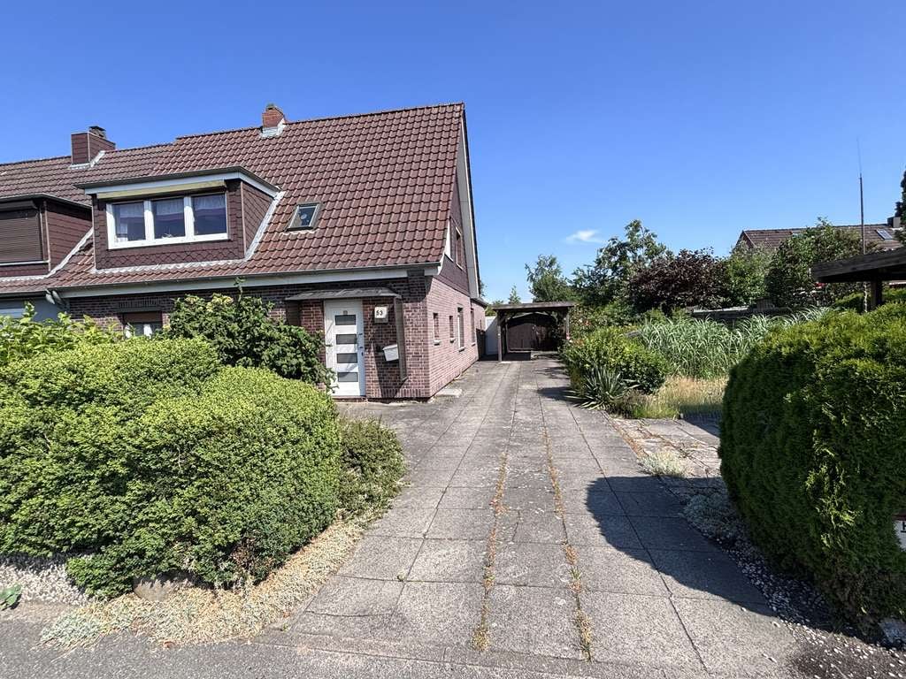 Immobilie in Nortorf - Modernisierte DHH mit neuem Dach, Wintergarten, Terrasse, Wallbox & Koi-Teich (Römbke Immobilien KG) - Bild 0