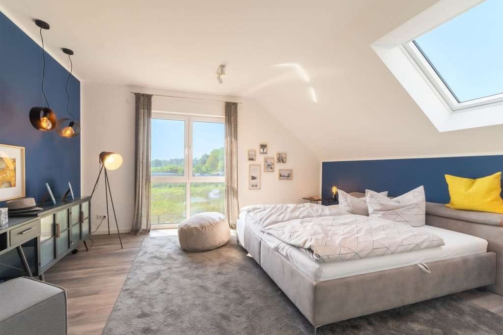Immobilie in Wülfershausen an der Saale - Individuell geplantes Mehrfamilienhaus in Wülfershausen a.d.Saale - Komfort und Nachhaltigkeit auf 2 - Bild 3
