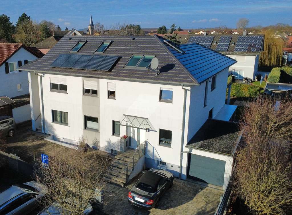 Immobilie in Ober-Hilbersheim - Modernisierte Ober- und Dachgeschosswohnung über zwei Ebenen im ausgebauten Bungalow - Bild 1