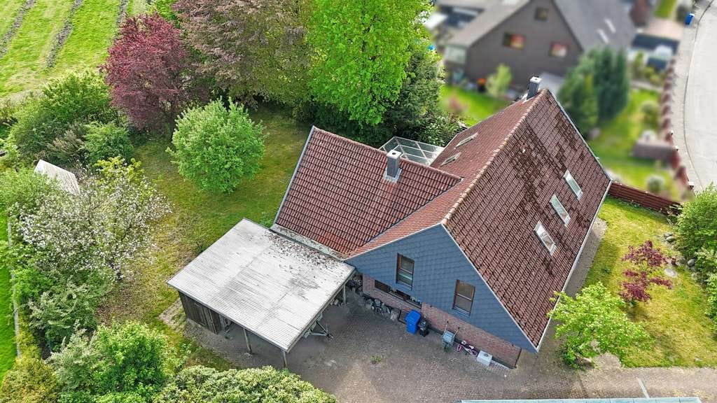Immobilie in Alveslohe - Gut geschnittenes Einfamilienhaus auf großzügigem Grundstück in Feldrandlage in Alveslohe - Bild 4