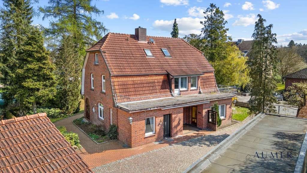 Immobilie in Hanstedt - Einfamilienhaus mit Hof und weitläufigem Grundstück - Bild 1
