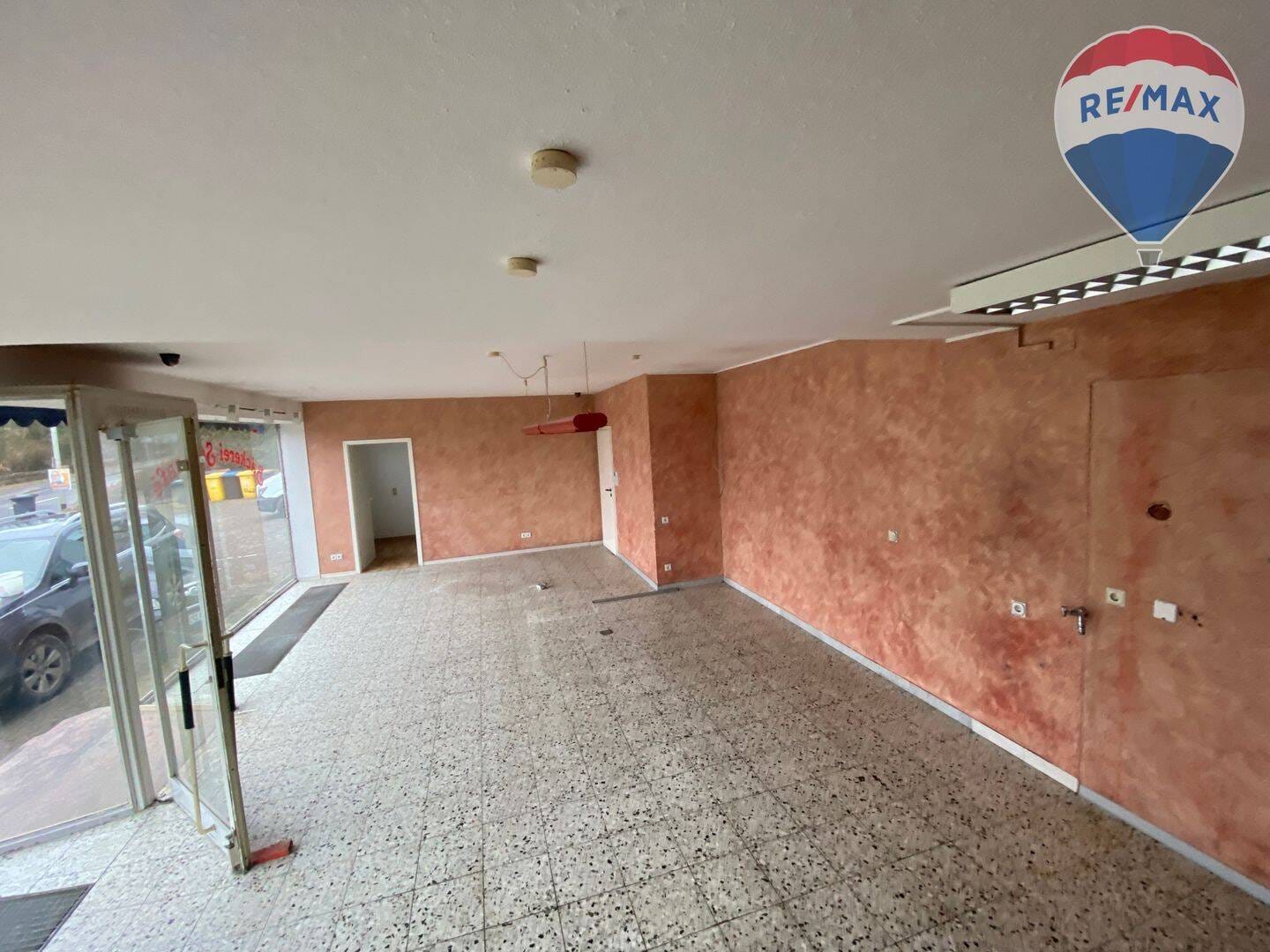 Immobilie in Holzappel - Mehrfamilienhaus mit Ladengeschäft und Halle - Bild 3
