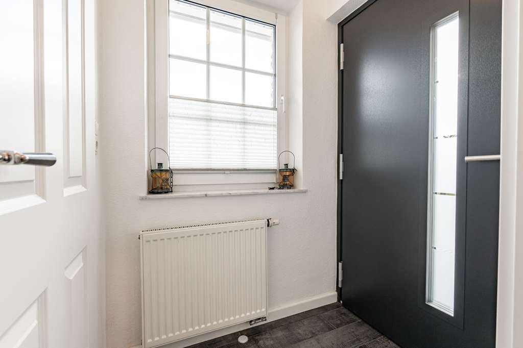Immobilie in Rickling - Exklusives Einfamilienhaus mit hochwertiger Ausstattung, Sauna, Wintergarten und großem Grundstück - Bild 4