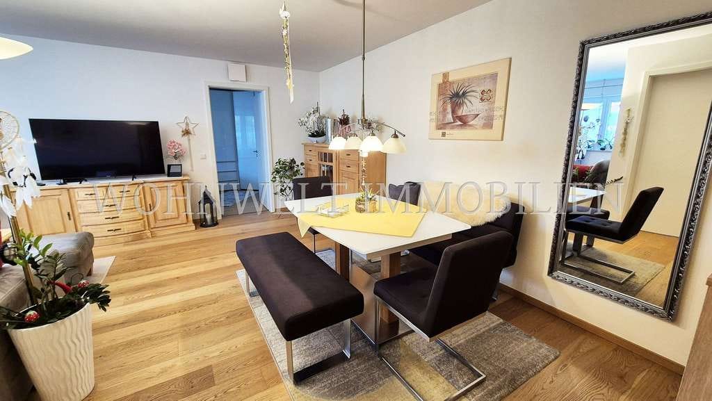Immobilie in Neufahrn in Niederbayern - Helle, barrierefreie 2-Zi.-EG-Wohnung mit gepflegtem Garten - Bild 1