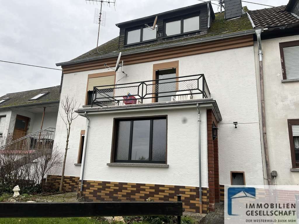 Immobilie in Hümmerich - Vermietetes Reihenmittelhaus mit kleinem Nebengebäude in Hümmerich! - Bild 0