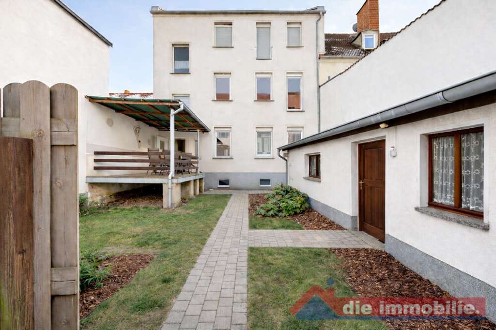 Immobilie in Burg - ***Mehrfamilienhaus mit 4 Wohnungen, 2 Garagen und Büro*** - Bild 1