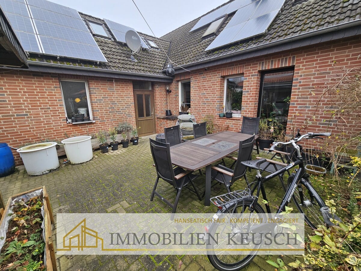 Immobilie in Twistringen - Energieeffiziente DHH mit PV, neuer Wärmepumpe und wasserführendem Kamin in Bestlage - Bild 4