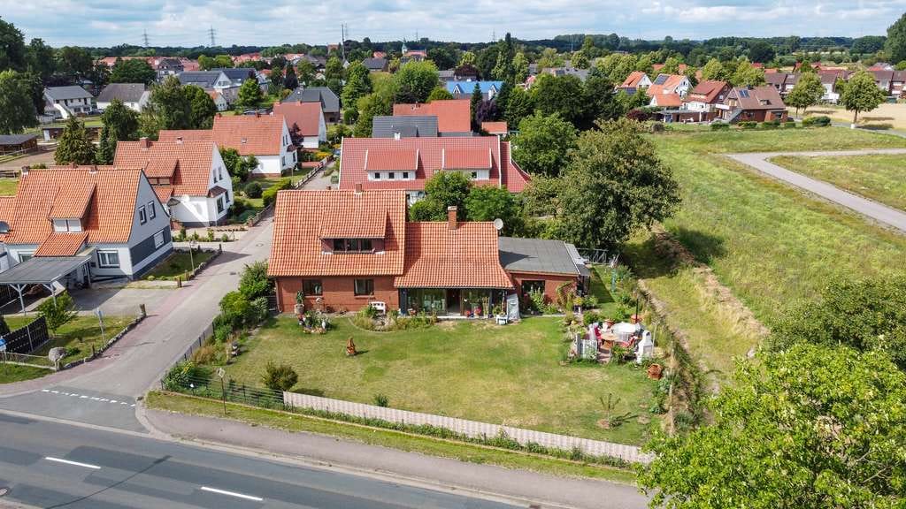 Immobilie in Lemförde - Wohngenuss mit Charme - gepflegtes Ein- bis Zweifamilienhaus mit Wintergarten - Bild 4