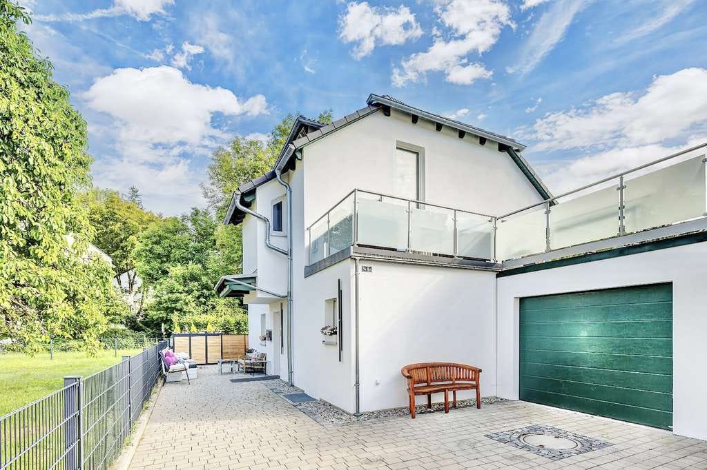 Immobilie in Unterföhring - Architekten-Haus in idyllischer A1-Mikrolage, Raumwunder, 300m Luftlinie zur Isar, 8km v. Zentrum!  - Bild 1