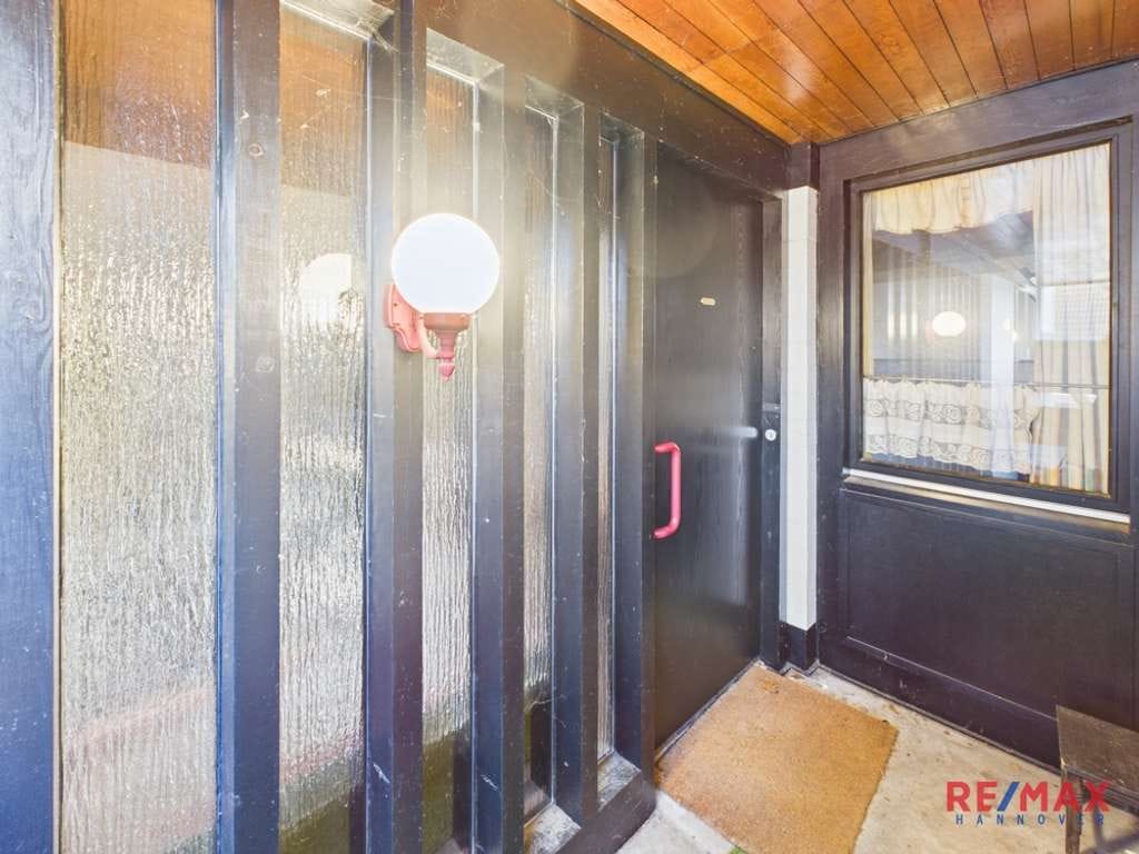 Immobilie in Hambühren - Hambühren: Charmante Immobilie mit Potenzial und großzügiger Nutzfläche im Keller! - Bild 1