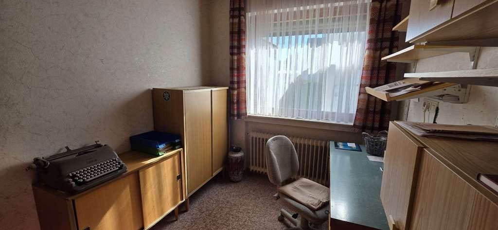 Immobilie in Weener - Solides Flachdachhaus mit Gartenidylle in angenehmer Wohnlage - Bild 4