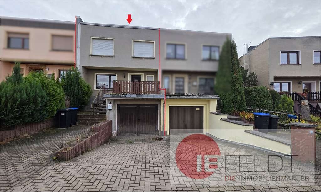 Immobilie in Helbra - Familienfreundliches Reihenhaus mit Garage, Terrasse, Balkon und Garten in gepflegtem Umfeld - Bild 0