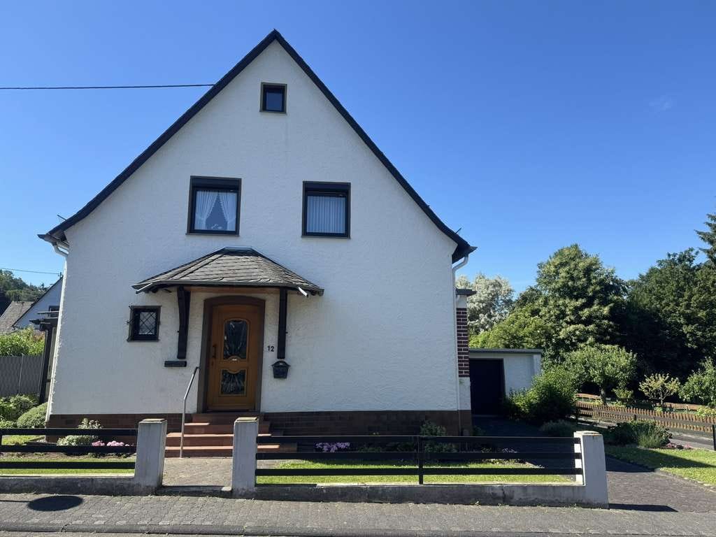 Immobilie in Bad Hönningen - Gepflegtes, freistehendes Einfamilienhaus mit Wintergarten - Bild 1