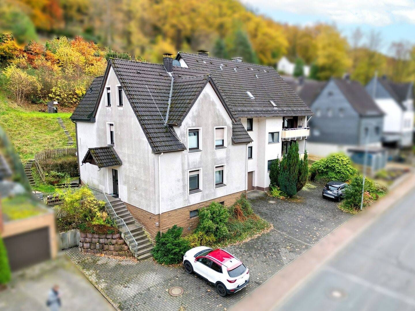 Immobilie in Plettenberg - SCHADE IMMOBILIEN - Vielseitiges Mehrfamilienhaus zur Eigennutzung oder Kapitalanlage! - Bild 1