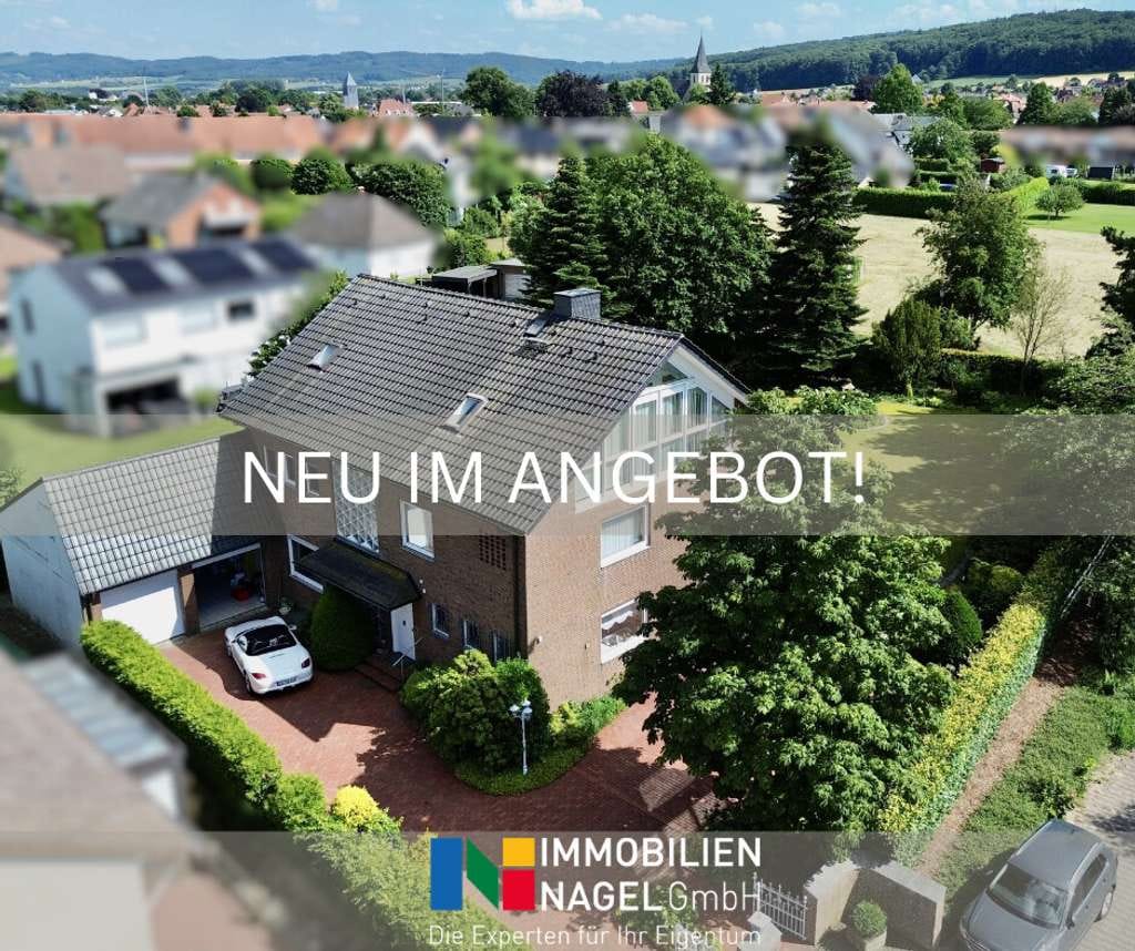 Immobilie in Preußisch Oldendorf - Grüne Oase mitten in Preußisch Oldendorf – Familienhaus mit viel Raum und Charme - Bild 1