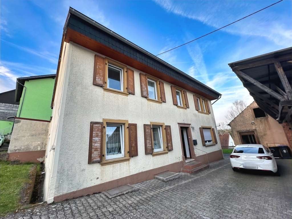 Immobilie in Merchweiler - Großzügiges Einfamilienhaus mit Potenzial - Bild 1
