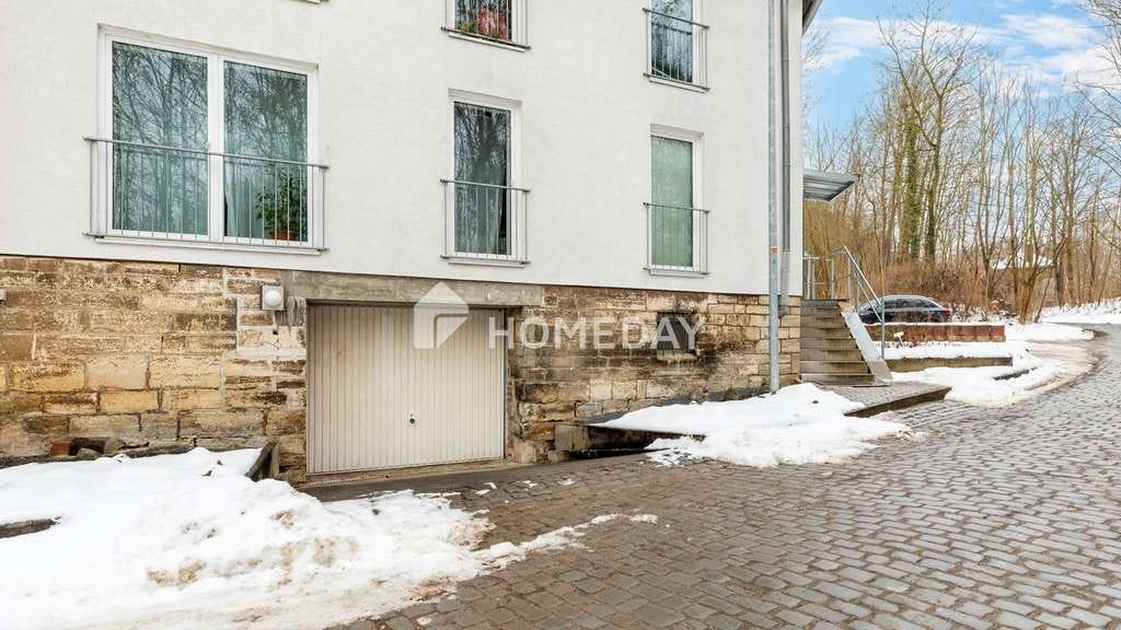 Immobilie in Bad Gandersheim - Charmantes 4-Familienhaus in ruhiger Hanglage – Solide Kapitalanlage mit 4 Garagen & 2 Stellplätzen - Bild 1
