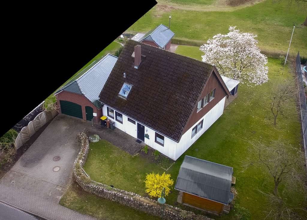Immobilie in Borstel-Hohenraden - Familienoase mit weitem Blick ins Grüne - Bild 2