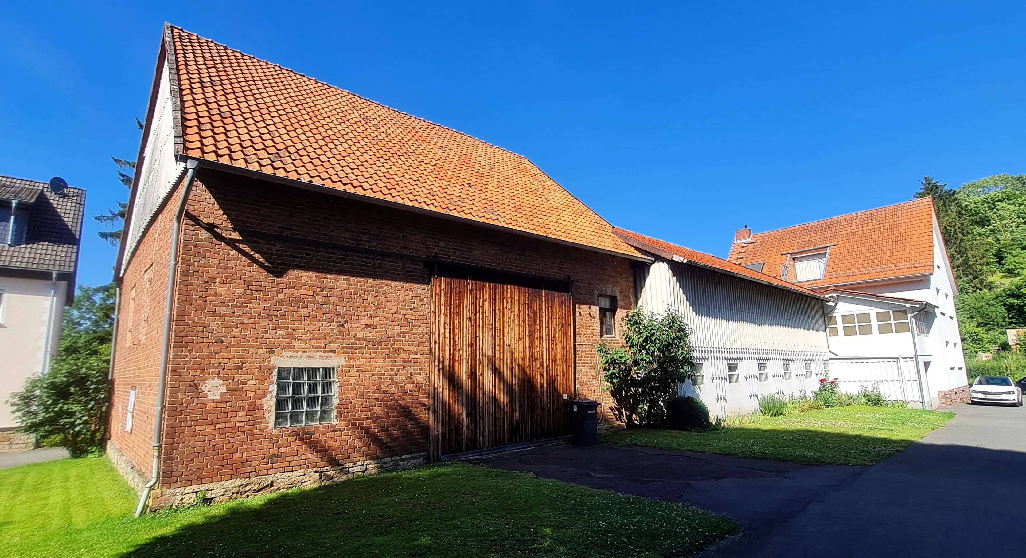 Immobilie in Warburg - Modernisiertes Einfamilienhaus mit Gewerbe- oder Lagerfläche in Warburg-Dalheim - Bild 2