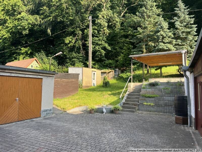 Immobilie in Nünchritz - Einfamilienhaus mit Garage, Nebengebäuden und überdachter Terrasse - Bild 3