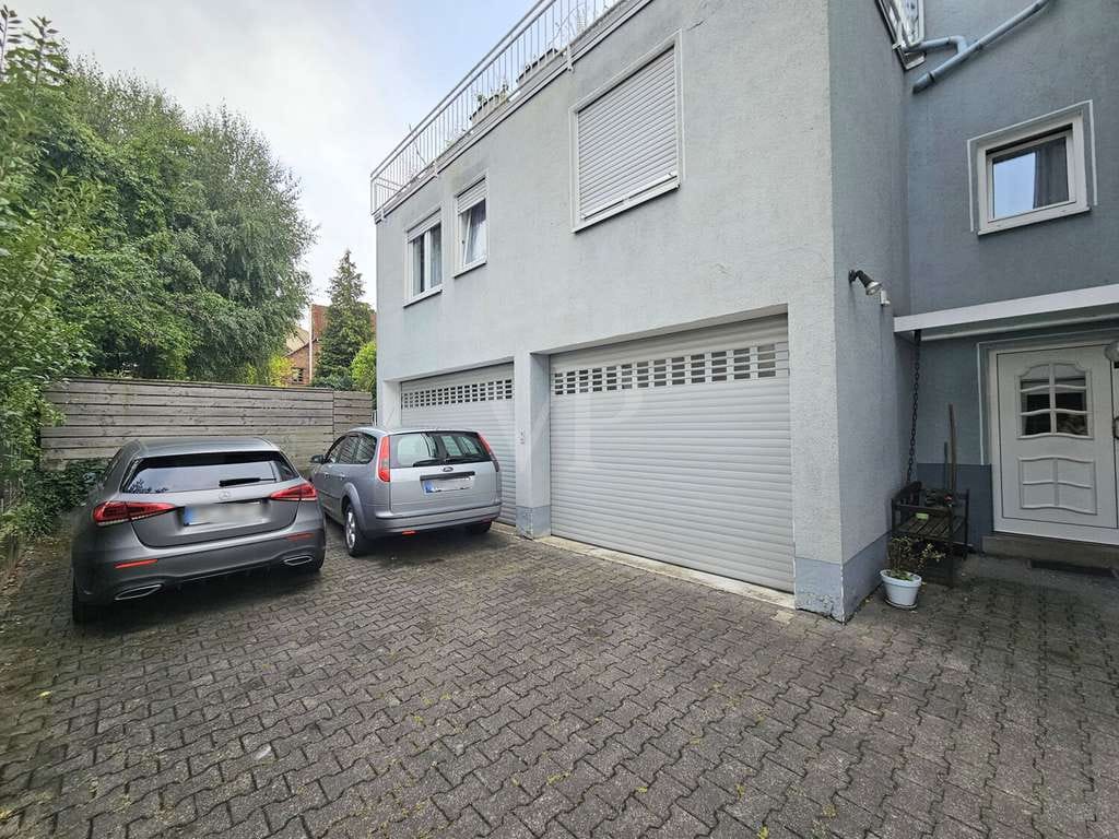 Immobilie in Neu-Anspach - Wohnen und Arbeiten unter einem Dach: Wohn- und Geschäftshaus in zentraler Lage von Neu-Anspach - Bild 1