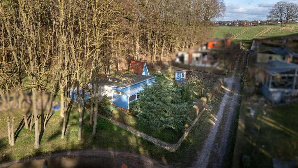 Immobilie in Groß Nemerow - Naturnaher Ferienbungalow in ruhiger, idyllischer Lage am Tollensesee - Bild 3