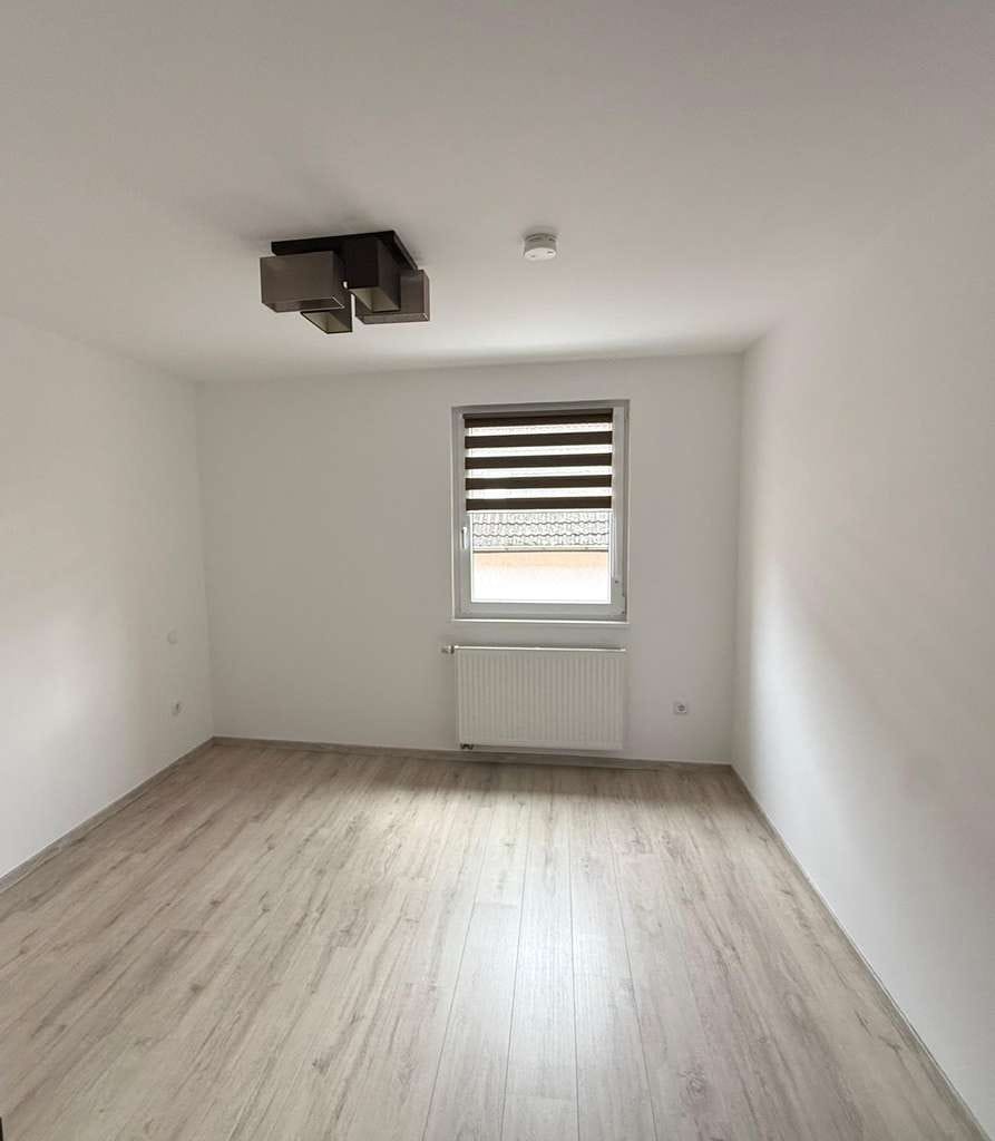 Immobilie in Lustadt - NEUER PREIS ! Attraktive 3-Zimmer Wohnung mit Balkon und Gartenanteil - Bild 4
