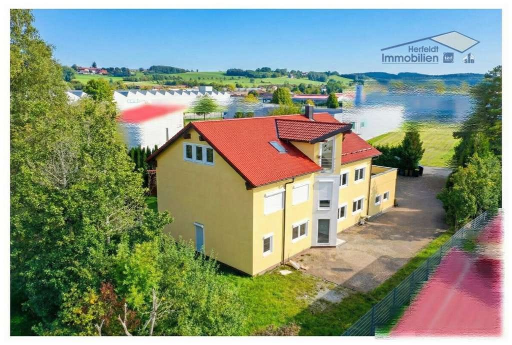 Immobilie in Ottobeuren - 8% Rendite! Vielseitiges Wohn- und Gewerbeanwesen mit zusätzlichem Baugr. für Gewerbe in Ottobeuren - Bild 1