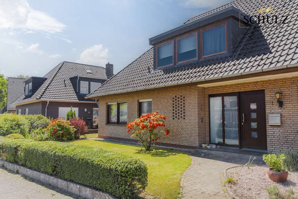 Immobilie in Friesoythe - ** Warum neu bauen? Großzügiges Familienhaus mit Traumgarten und Bachlauf ** - Bild 1