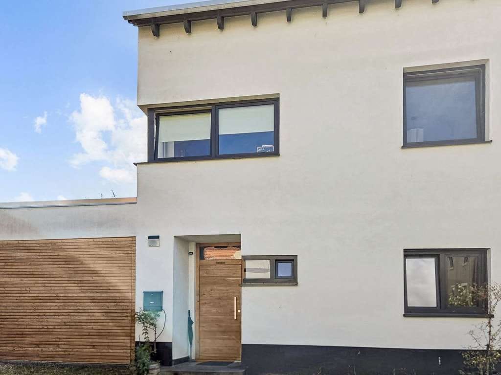 Immobilie in Hanhofen - Hanhofen - Exklusive Doppelhaushälfte mit außergewöhnlichem Gartenambiente - Bild 1