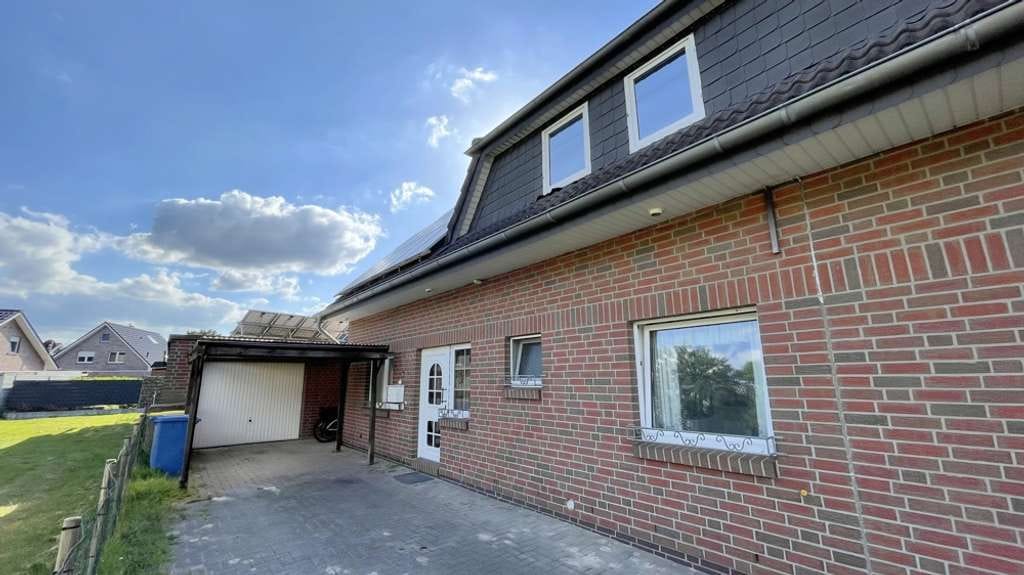 Immobilie in Friesoythe - Kapitalanlage! Solide Doppelhaushälfte mit PV-Anlage, Garage und großem Gartenbereich in Friesoythe - Bild 1