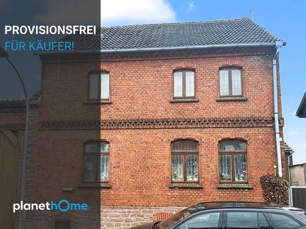 Immobilie in Altenhausen - Charmantes Einfamilienhaus mit Innenhof und Nebengelass in Ivenrode - Bild 0