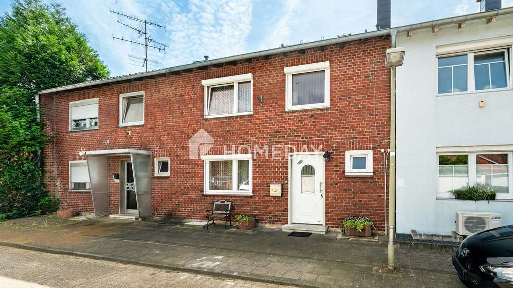 Immobilie in Erkelenz - Beständigkeit und Zukunft: Reihenhaus mit Garage, Partykeller, PV-Anlage und Solarthermie - Bild 0