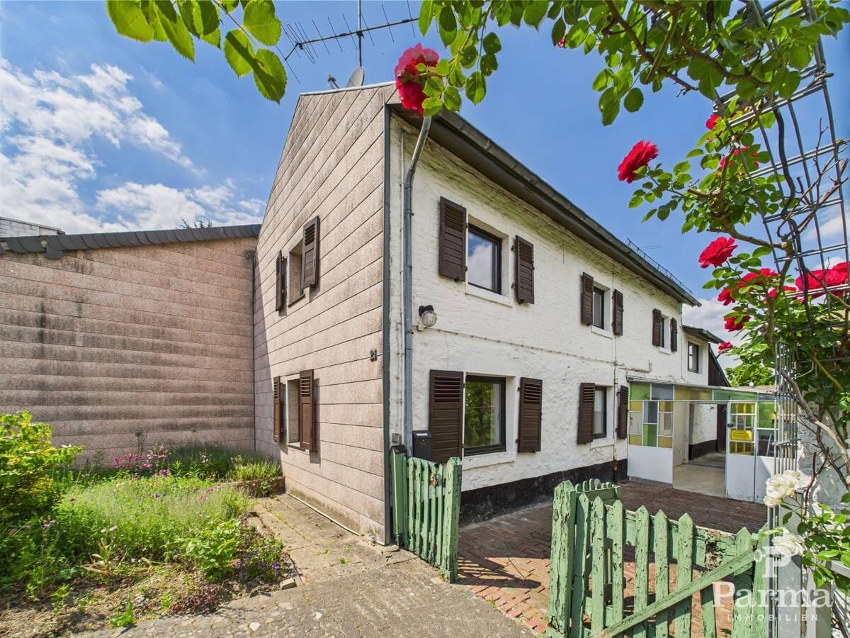 Immobilie in Langerwehe - Einfamilienhaus mit Entwicklungspotential in ruhiger Lage von Langerwehe-Schlich - Bild 0