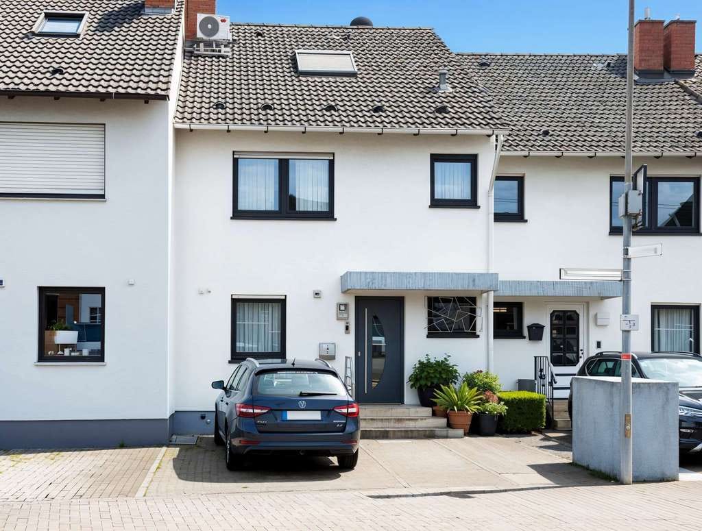 Immobilie in Ketsch - Gepflegtes Reihenmittelhaus mit Garten, Garage und Ausbaupotenzial in Ketsch - Bild 0