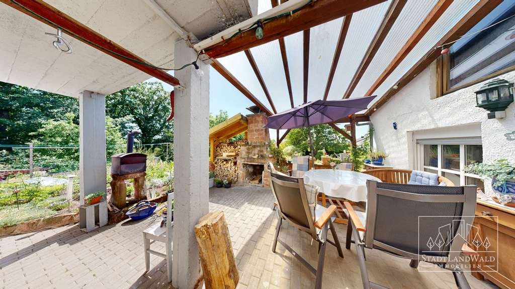 Immobilie in Clausen - Gepflegtes Zweifamilienhaus mit großem Garten, Carport und Garagen in Clausen - Bild 4
