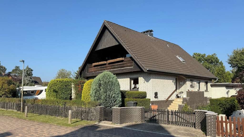 Immobilie in Hambühren - Einfamilienhaus mit großem parkähnlichem Grundstück in Oldau - Bild 2