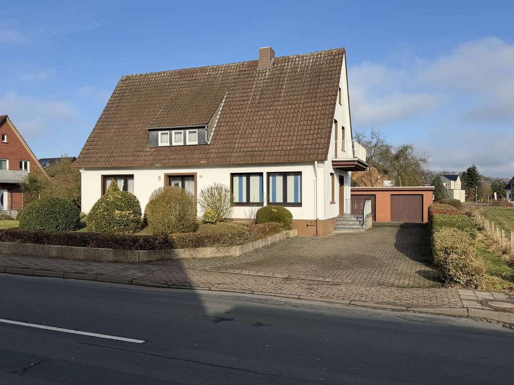 Immobilie in Lotte - Sanierungsbedürftiges Einfamilienhaus in bester Lage mit Entwicklungspotential - Bild 1