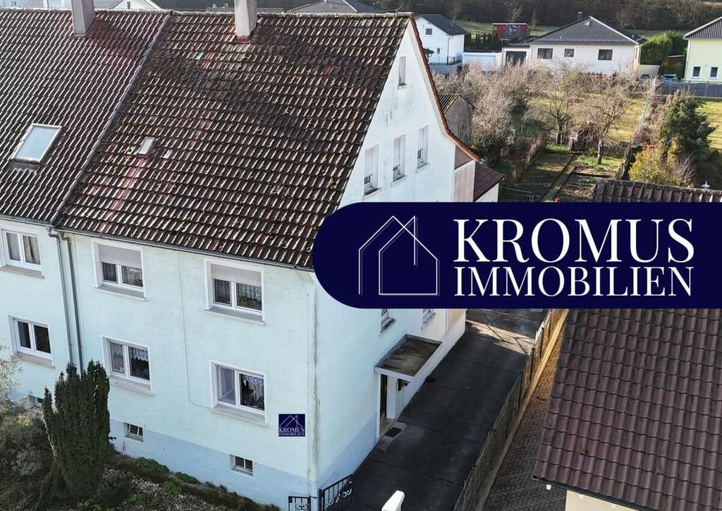 Immobilie in Eisingen - Zweifamilienhaus mit Garagen und Entwicklungspotential zum Dreifamilienhaus in Eisingen - Bild 0