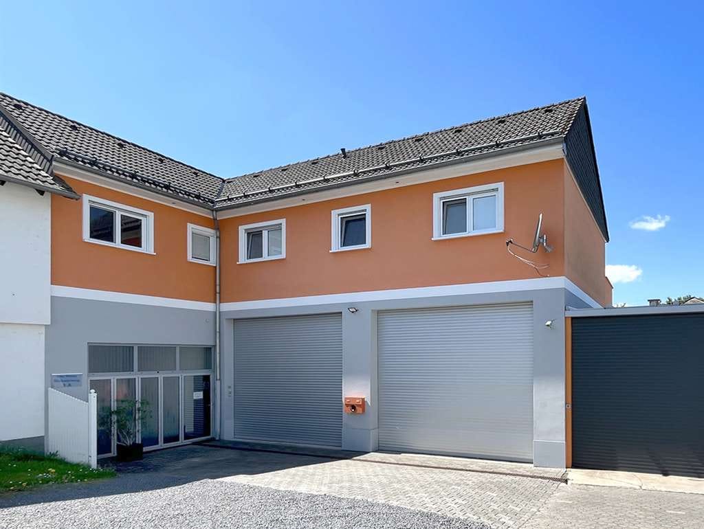 Immobilie in Holzappel - Arbeiten und Wohnen unter einem Dach - moderne Wohnung plus großzügige Werkstatt oder Lager - Bild 0