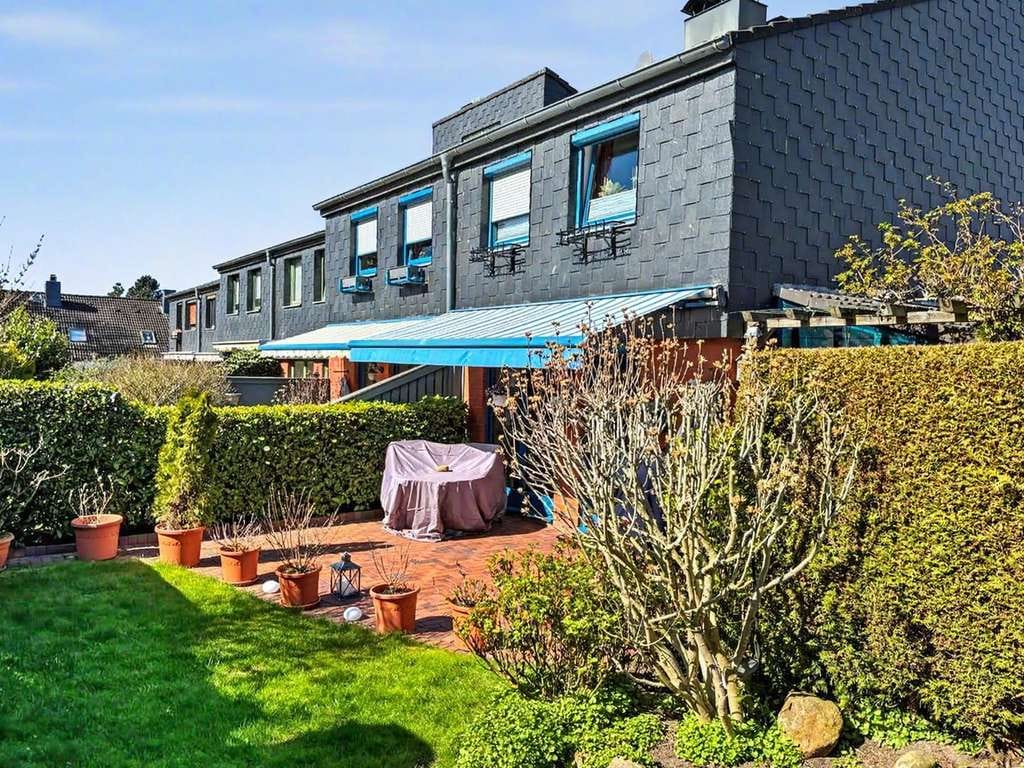 Immobilie in Quarnbek - Wohnkomfort mit Charakter – Reihenendhaus mit Kamin und Garten in Kiel - Bild 0