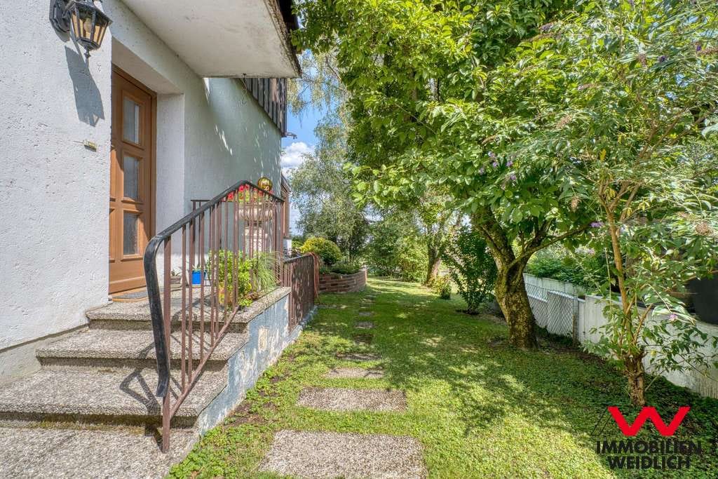 Immobilie in Steinhöring - Doppelhaushälfte mit Wintergarten, zwei Terrassen und Garten – Potenzial für Ihr neues Zuhause - Bild 1