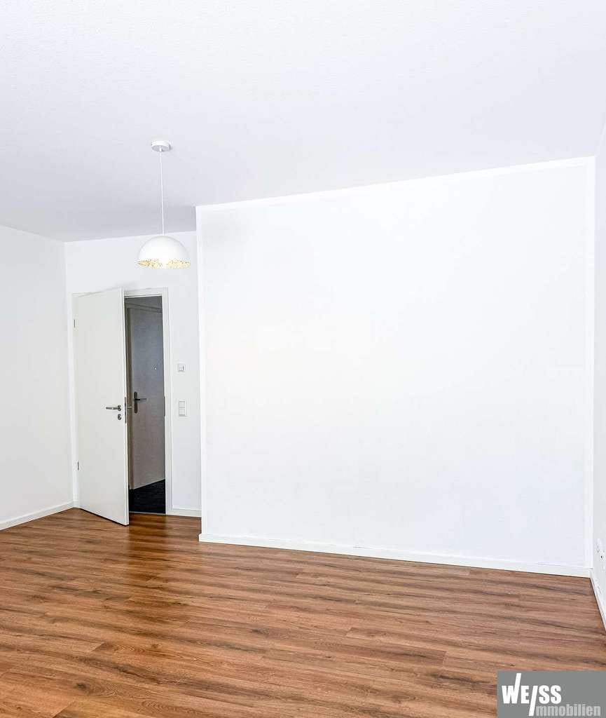 Immobilie in Marktheidenfeld - Neuwertige 3-Zimmer-Wohnung in unmittelbarer Nähe zum Main mit Tiefgaragen- und Außenstellplatz - Bild 2