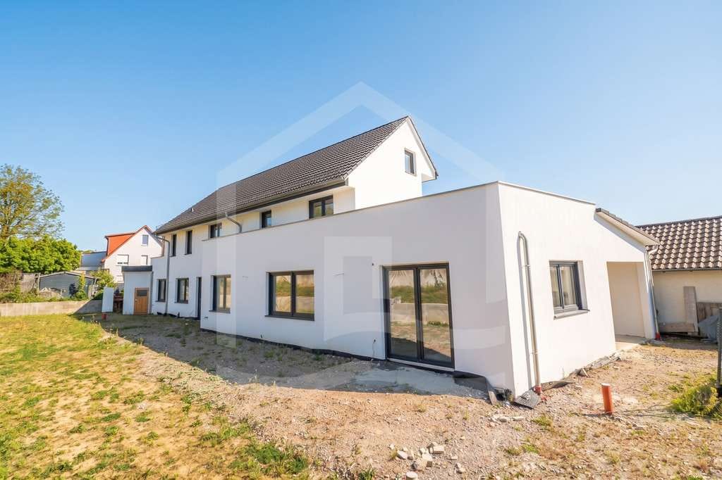 Immobilie in Helmstadt-Bargen - Moderne Erdgeschosswohnung mit exklusiver Ausstattung und großem Garten - Bild 4