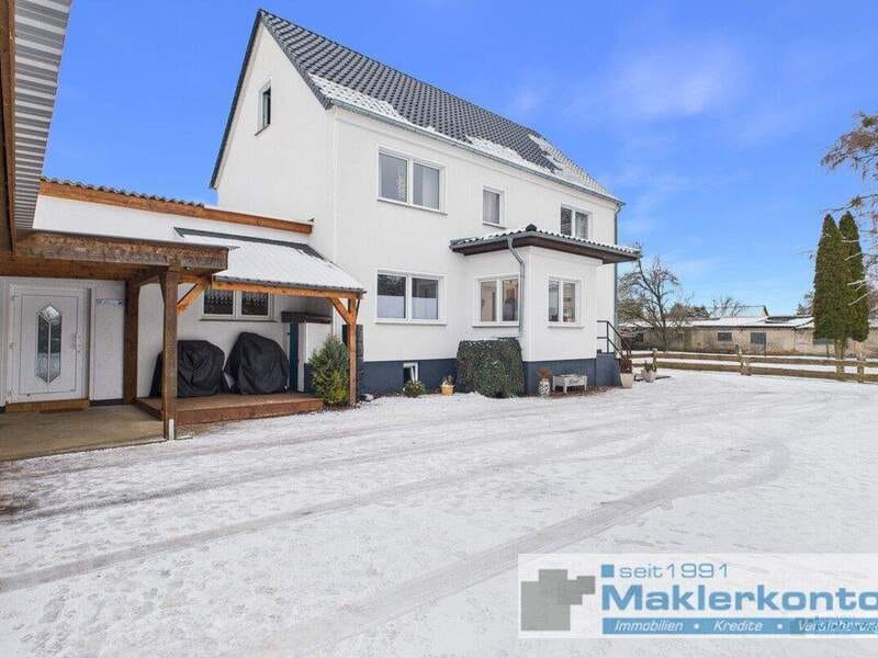 Immobilie in Neustrelitz - Geniales Familienparadies mit Einliegerwohnung, großem Grundstück und Doppelcarport - Bild 0