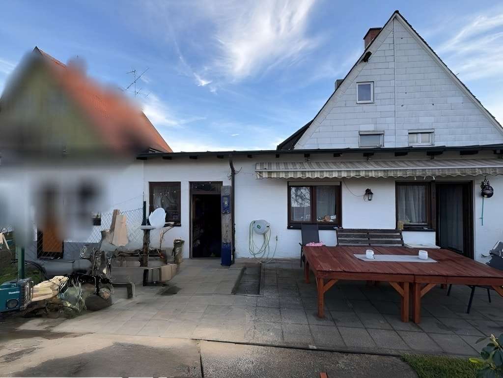 Immobilie in Villingen-Schwenningen - Vermietete Doppelhaushälfte mit Garage - Bild 1
