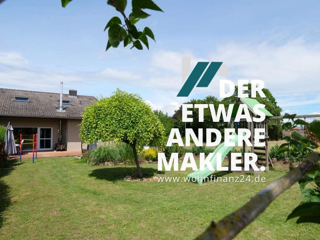 Immobilie in Erbes-Büdesheim - Wohnen am Feldrand – großzügige Doppelhaushälfte mit Gartenparadies! - Bild 0