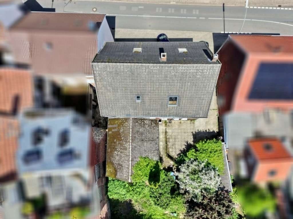 Immobilie in Oelde - Mehrfamilienhaus mit Potenzial in zentrumsnaher Lage von Oelde – vielseitige Nutzungsmöglichkeiten - Bild 1